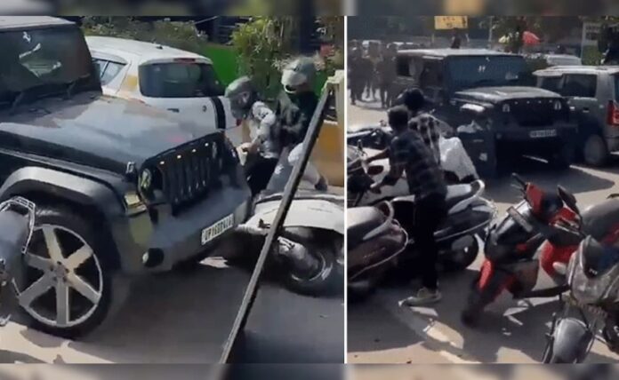 <b>out-of-control:-mahindra-thar-causes-chaos-on-noida-roads,-dodging-pedestrian-disaster</b>